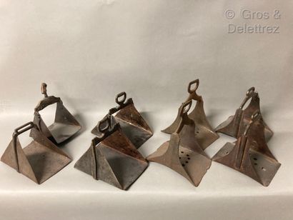 null Set of eight iron stirrups, some openwork.

Middle Eastern work, 19th century

Pitting...