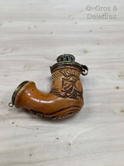  Two meerschaum(?) pipes with a horse running in front of a fence and a man with...