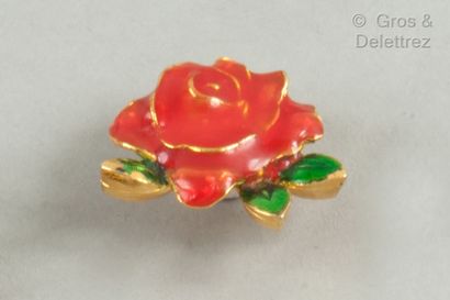 UNGARO Pins in gilded metal with a red rose. Signed