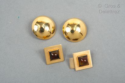 Yves Saint LAURENT Lot composed of a pair of gilded metal ear clips and a pair of...