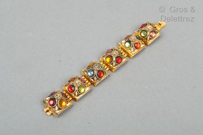 KALINGER Bracelet articulé en métal doré, surmonté de dômes rehaussés de strass à...