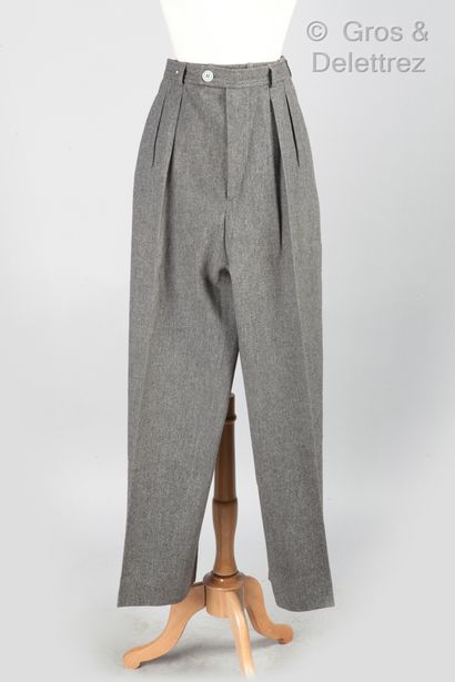 SAINT LAURENT Rive Gauche Lot composed of a pair of grey woolen straight trousers,...