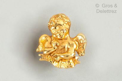 Emanuel UNGARO Pins in gilded metal representing a cherub. Signed.