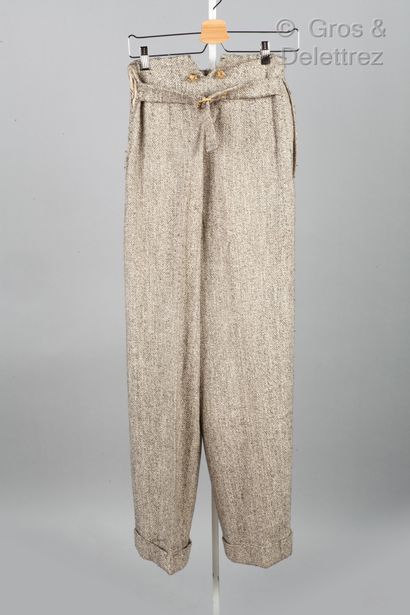 Christian DIOR Boutique Lot composé d'un pantalon droit en laine ardoise et d'un...
