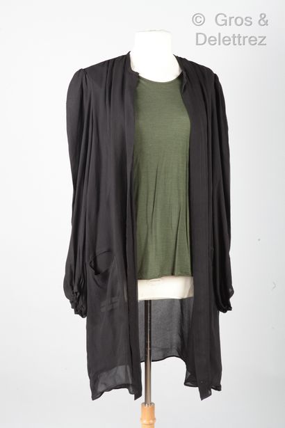 Le DIX BALENCIAGA Paris Lot composed of a long black silk waistcoat, round neckline,...