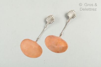 ANONYME Pair of silver plated metal clips forming a scallop shell continuing with...