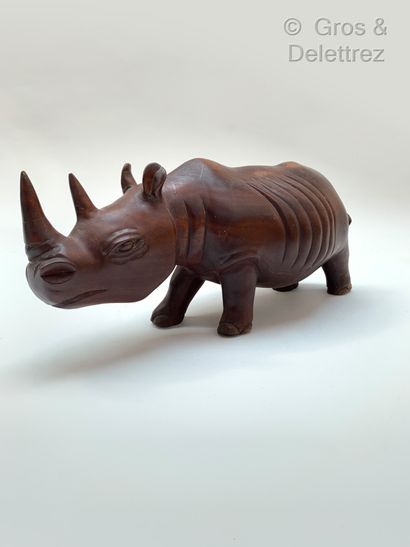 TRAVAIL FRANÇAIS Mahogany rhinoceros

L : 65 cm

(accident to the horn)