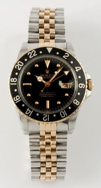 ROLEX «GMT Master» Réf. 16753 Bracelet montre en or jaune et acier, cadran noir,...