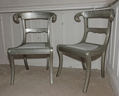 Pair of silver plated wood chairs, the back...