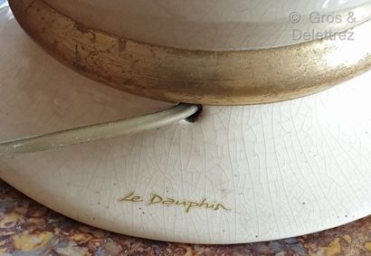 null Maison LE DAUPHIN

Deux lampes en céramique craquelée ivoire et rehaussée d'or.

H....