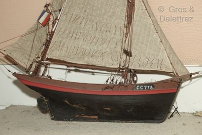 null Model of a three-masted square ship in natural wood. 

85 x 114 cm

Model of...