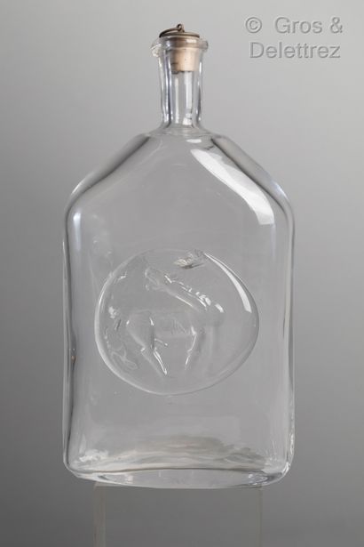 null (Saint-Denis) Moulded glass decanter decorated with a medallion showing a horse

H...