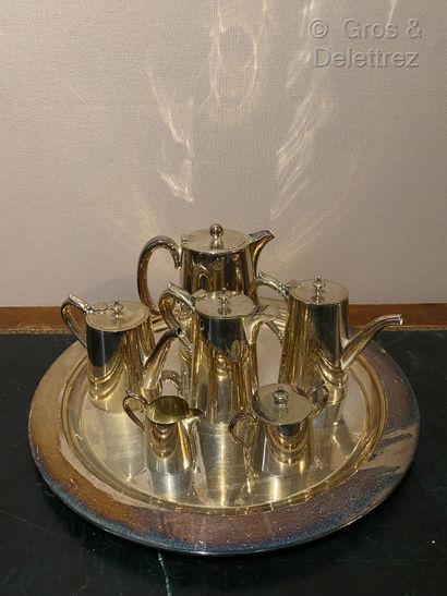 null (Study) Tea and coffee set in silver metal composed of three pots, a milk jug...