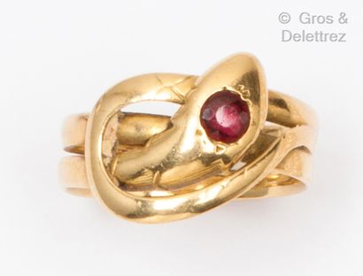 null Yellow gold "Serpent" ring, the body interlaced, the head set with a faceted...