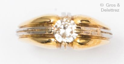 Yellow and white gold ring set with a brilliant-cut...