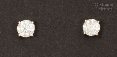 A pair of white gold earrings set with brilliant-cut...