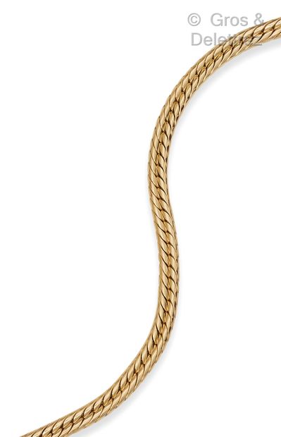 Flexible bracelet in yellow gold braided,...