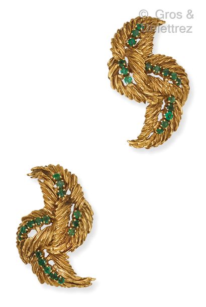 Pair of yellow gold ear clips, decorated...