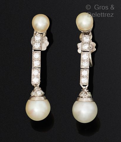 Pair of white gold earrings, composed of...
