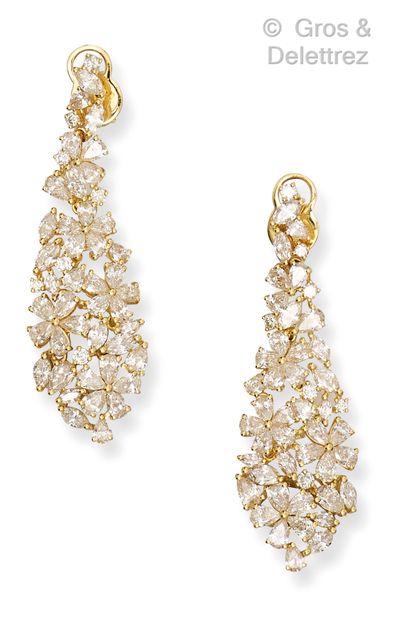 Pair of yellow gold earrings, composed of...