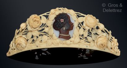 null An ivory tiara finely carved with roses and openwork, decorated with a cameo...