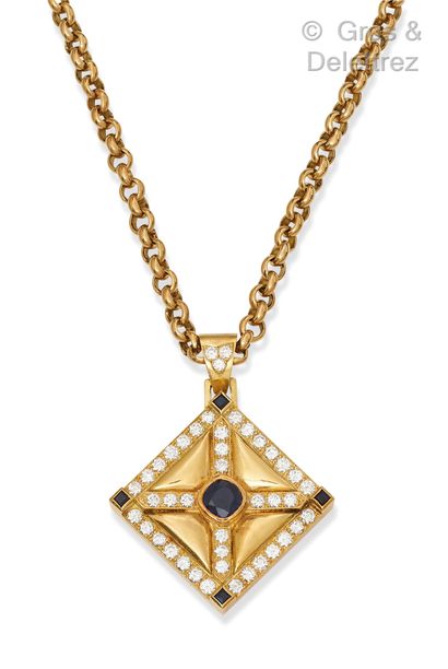 A square yellow gold pendant with a faceted...