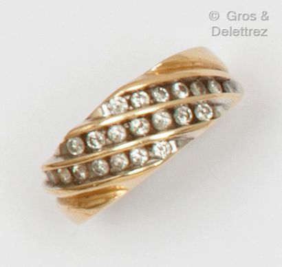 null 14K yellow gold "Jonc" ring, set with lines of brilliant-cut diamonds. Finger...