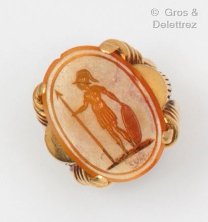 null Yellow gold ring, set with an intaglio on agate engraved with a figure holding...