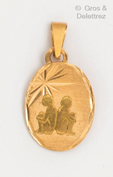 Médaille « Signe du Gémeau » en or jaune....