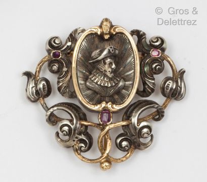 null Yellow gold and silver brooch, decorated with a figure in the round on a rockery...