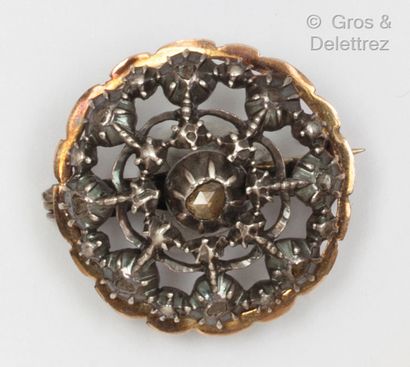 null A yellow gold and silver circular brooch set with rose-cut diamonds. Napoleon...