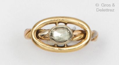 null Yellow gold ring, composed of an oval motif set with a rose-cut diamond. The...