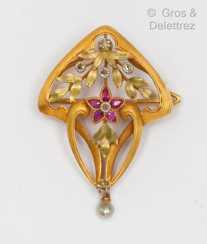 A yellow gold brooch, partially enamelled...