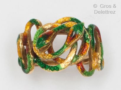 null Serpents" ring in chased yellow gold with polychrome enamel, the bodies interlaced....