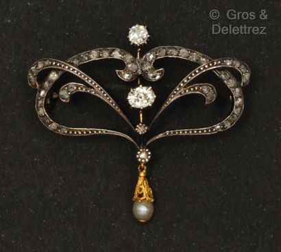 null Yellow gold and silver "Volute" brooch, decorated with interlacing rose-cut...