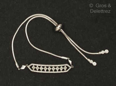 White gold bracelet, decorated with a geometrical...
