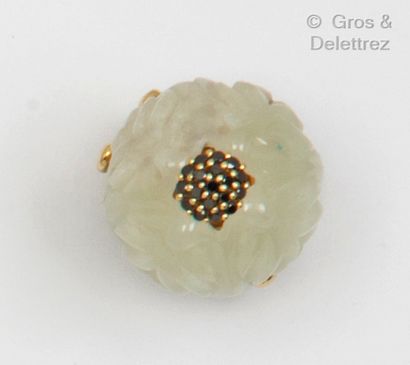 SHAOO A yellow gold ring with a carved white jade dome decorated with a flower topped...
