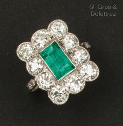 A white gold ring set with a rectangular...