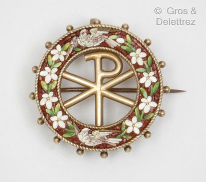 null A vermeil brooch, decorated with a chrism underlined by a frieze of micro-mosaic...