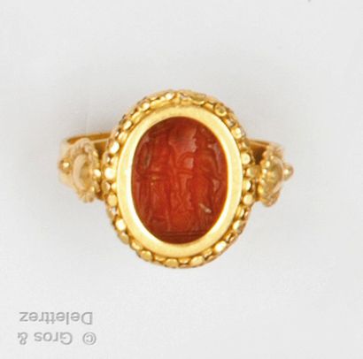 Yellow gold ring, set with a carnelian intaglio...