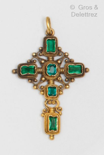 null Cross in yellow gold, filigree and beaded, set with green stones. Length : 5...