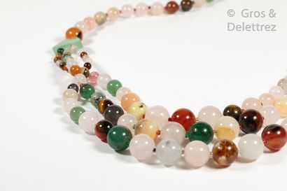 null Necklace composed of three rows of multicolored quartz beads and imitation pearls....