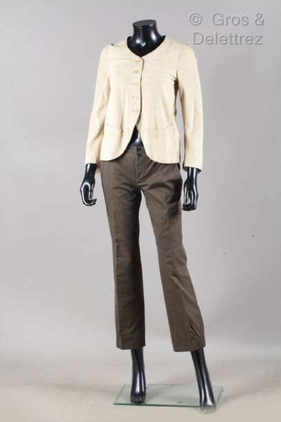 GUCCI Outfit consisting of a beige lambskin velvet jacket, round neckline, single...