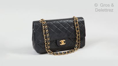 CHANEL circa 1991 Classic" bag 26cm in black quilted lambskin leather, CC clasp in...