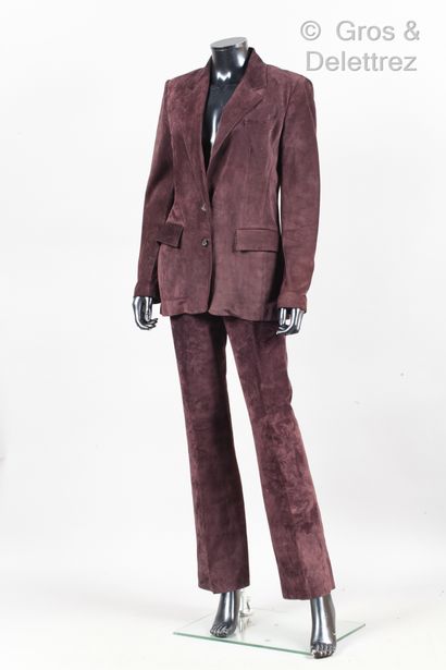 GUCCI Pantsuit in burgundy lambskin, consisting of a jacket, notched shawl collar,...