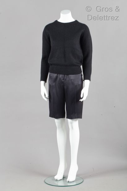 CELINE Iconic set composed of a 100% black cashmere sweater, round neckline, long...