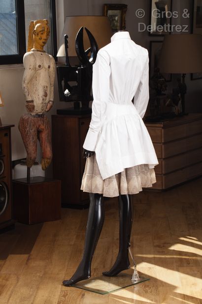 ALAÏA Outfit consisting of a white cotton shirt, small collar, single breasted, long...