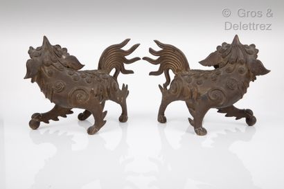 null Chine du Sud, - Vietnam, vers 1900

Paire de lions en bronze de patine noire,...