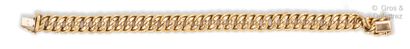 null Yellow gold bracelet with a russian engraved curb chain. French work of the...