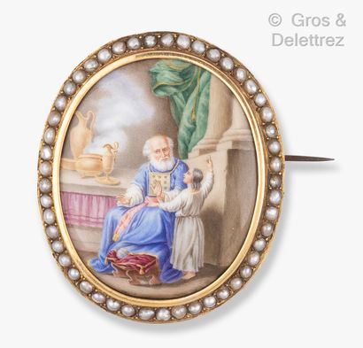 null A yellow gold oval brooch with an enamelled miniature surrounded by half pearls....